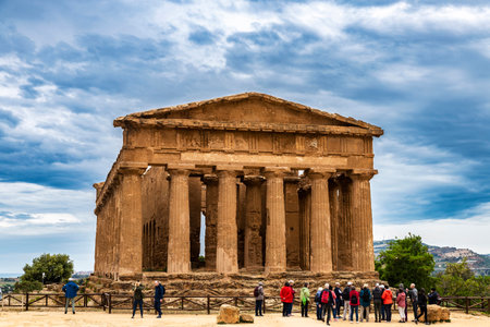 Agrigento, Italy - May 8, 2023: Temple of Concordia in the Valle dei Templi or Valley of the Temples with people around in Agrigento, Sicily, Italyのeditorial素材