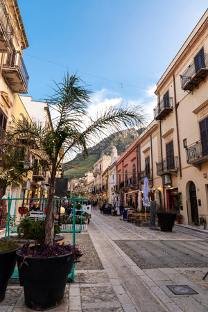 Castellammare del Golfo, Italy - May 11, 2023: Shopping street of Castellammare del Golfo with people around in Trapani, Sicily, Italyのeditorial素材