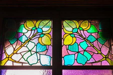 Stained-glass window decorated with floral shapes of the Palau de la Musica Catalana or Catalan music palace, concert hall designed by Lluis Domenech i Montaner in Barcelona, Catalonia, Spainのeditorial素材