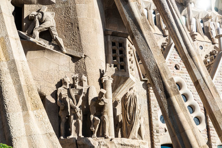 Barcelona, Spain - November 30, 2023: Passion Facade of the Sagrada Familia or Church of the Holy Family, large Roman Catholic church designed by Catalan architect Antoni Gaudi in Barcelona, Catalonia, Spainのeditorial素材