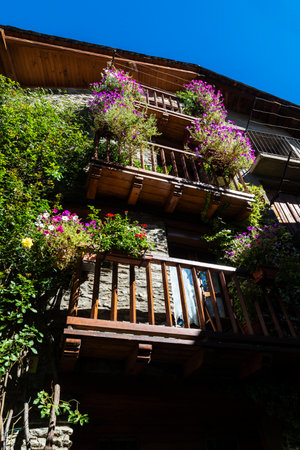 Facade of a typical house of the rustic village of Esterri Aneu, Lleida, Catalonia, Spain