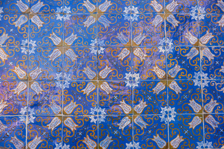 Close-up of decorated tiles as background of the Palace of Raio, an old classic building in the old...