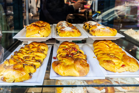 Display of a pastry and bakery shop in the old town of Porto or Oporto, Portugalの写真素材