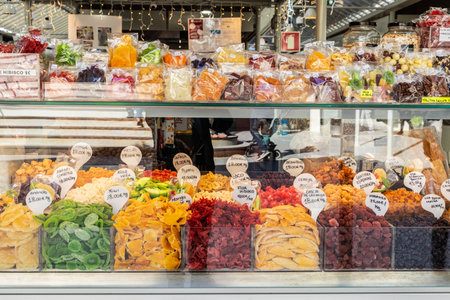 Porto, Portugal - November 23, 2023: Dried fruit shop in Bolhao Market, street food market in Porto...
