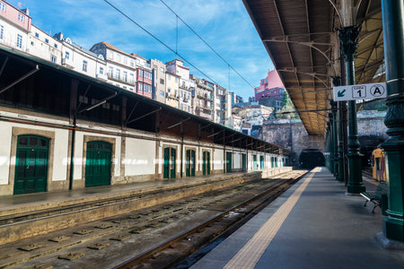 Porto, Portugal - November 25, 2023: Stopped train at Sao Bento railway station platforms in Porto...