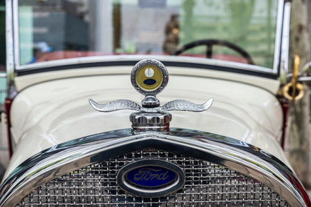 Barcelona, Spain - April 6, 2024: Sign of an old retro car from the 1920s of the brand Ford parked on a street in Barcelona, Catalonia, Spainのeditorial素材
