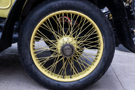 Barcelona, Spain - April 6, 2024: Wheel of an old retro car from the 1920s of the brand Hispano Switzerland parked on a street in Barcelona, Catalonia, Spainのeditorial素材