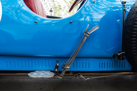 Hand brake of an old retro blue car from the 1920s parked on a street in Barcelona, Catalonia, Spainの写真素材