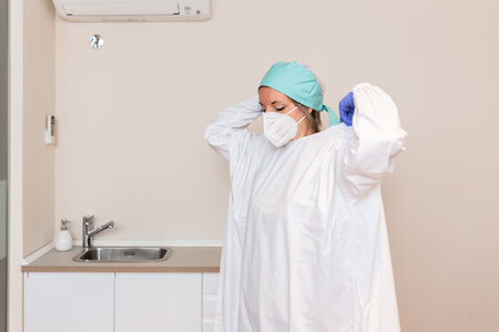 Portrait of female surgeon or nurse wearing protective uniformの写真素材