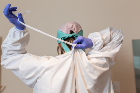 Portrait of female surgeon or nurse wearing protective uniformの写真素材