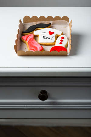 assortment box of handmade cookies as a gift for fathers dayの写真素材