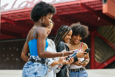Transgender person and friends using phone in the cityの写真素材