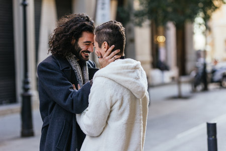 Happy gay couple in love smiling.の写真素材