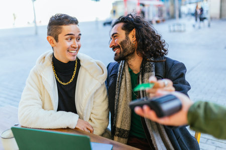 Happy gay couple enjoying time together outdoorsの写真素材