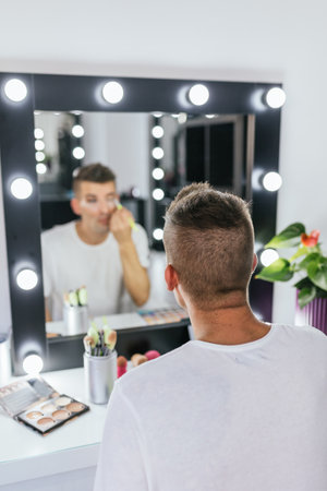 Drag queen artist getting ready in the dressing room.の写真素材