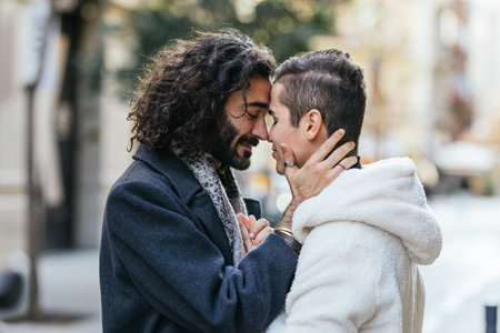 Loving embrace of a gay couple in the cityの写真素材