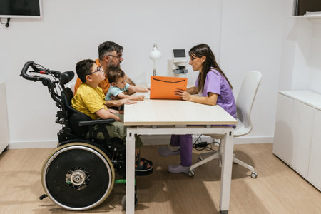 Family attending medical consultation with optometristの写真素材