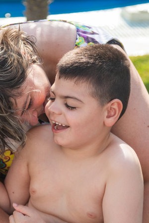 Mother and child bonding in swimming poolの写真素材