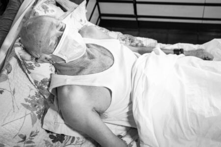 Coronavirus old man with face mask, Spain, Europe.の写真素材