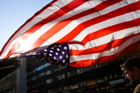 Berlin, Germany -20 Oct 2008-USA flag hanging next to the Check point Charlie in Berlinのeditorial素材