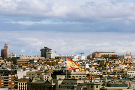 Big spanish flag of Columbus square in Madrid, Spainのeditorial素材