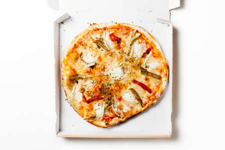 Cheese and pepper pizza in a cardboard boxの写真素材