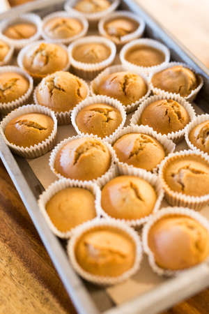 Yellow homemade muffinsの写真素材