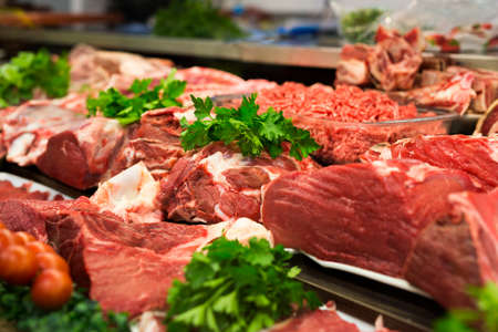 Meat showcase in a butcheryの写真素材