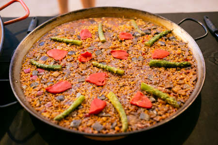 Vegan spanish paella with asparagus and pepperの写真素材