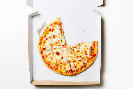 Tuna pizza in a cardboard boxの写真素材