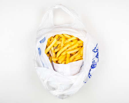 French fries in a plastic bagの写真素材