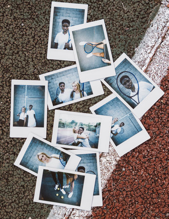 Instant pictures of two young women with tennis clothes on a tennis court.の写真素材