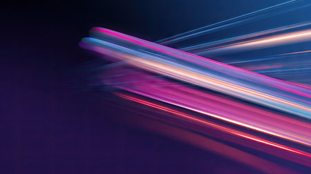 Dynamic composition presents abstract light trails traversing diagonally across a dark backdrop. The visual features vibrant hues, including pink, blue, and gold, suggesting movement and energy. This image's stylistic qualities lend it to potential applications in technology, design, or commercial illustrations where dynamism is desired.の素材