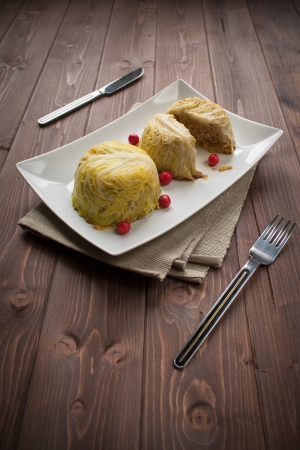 Filled cabbage patty in a dish for vegetarian mealの写真素材