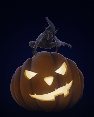 Creepy chreature on the halloween pumpkin lanternの写真素材
