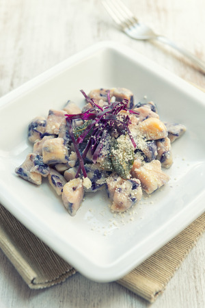 Gnocchi to the red cabbage for vegan mealの写真素材