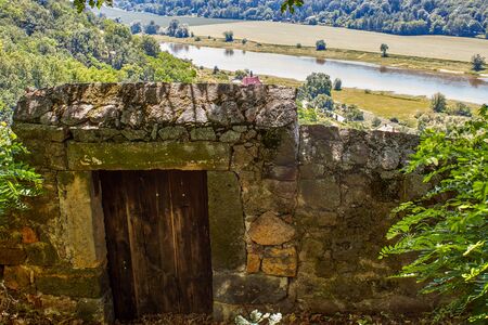 Old historic entrance gate to a Saxon vineyard in the Spaargebirge with a view over the Elbeの写真素材