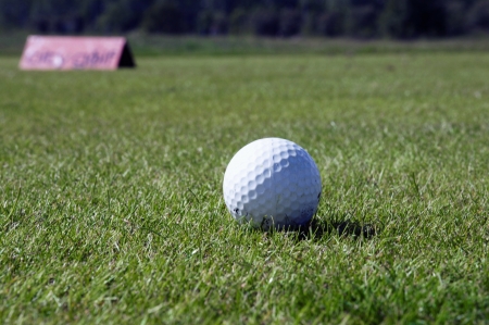 Golf Ball outside greenの写真素材