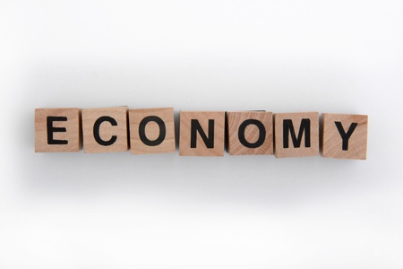 Wooden cubes spelling economyの写真素材