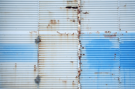 blue grungy metal door.の写真素材