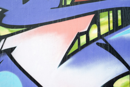 Multi coloured graffiti on a wallの写真素材