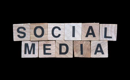 Social media spelled with wooden cubesの写真素材