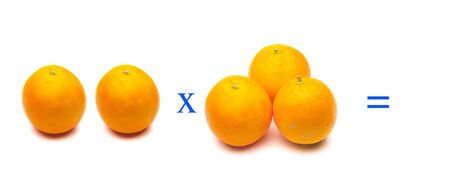mathematical operations with oranges; Orange very healthy fruit full of vitamin C; simple multiplication problems,の写真素材