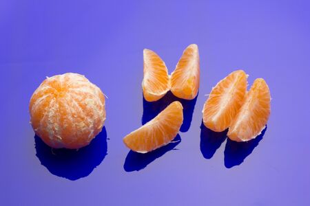 Tangerine is a very easy fruit to peel with your hands. The bark is orange with a sweet taste and a certain acid touch; Rich in vitamin, it is eaten raw.の写真素材