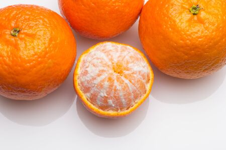 Tangerine is a very easy fruit to peel with your hands. The bark is orange with a sweet taste and a certain acid touch; Rich in vitamin, it is eaten raw.の写真素材