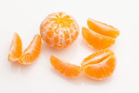 Tangerine is a very easy fruit to peel with your hands. The bark is orange with a sweet taste and a certain acid touch; Rich in vitamin, it is eaten raw.の写真素材