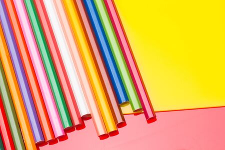 Colored pencils with a sharp point ready to draw and paint drawings; color with colors; color range from white to black through the entire color range, yellow, pink, green, blue, red, brown.の写真素材