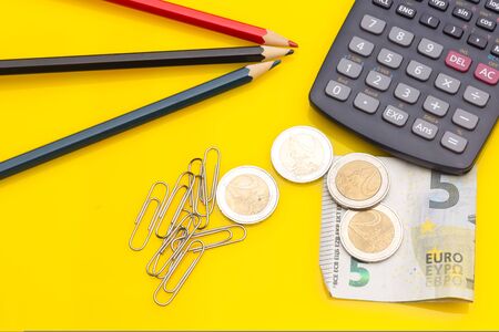 Papers, glasses and calculator to make calculations of the invoices we receive, to make graphs and statistics of our expenses or benefits. scientific calculator used by science studentsの写真素材