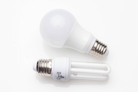Low consumption, less heat, responsible consumption with energy; energy saving light bulbs and maximum brightness to see well, read well; Perfectly illuminate our home and our workplace. Saving money.の写真素材