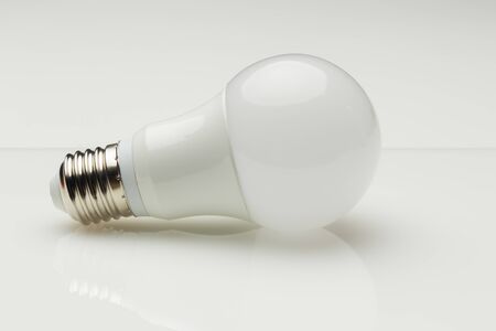 Low consumption, less heat, responsible consumption with energy; energy saving light bulbs and maximum brightness to see well, read well; Perfectly illuminate our home and our workplace. Saving money.の写真素材
